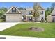 Charming two-story home with a brick facade, two-car garage, and well-maintained lawn at 1700 Cobblefield Cir, Dacula, GA 30019