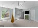 Bright bedroom with large windows and swing, creating a welcoming space at 266 Shellbark Dr, Mcdonough, GA 30252