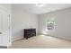 Bedroom with neutral carpet, dresser, and a window with a view at 266 Shellbark Dr, Mcdonough, GA 30252