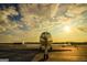 A corporate jet sits on the runway bathed in the golden light of dawn at 671 Ellison Rd, Tyrone, GA 30290