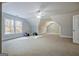 Spacious bonus room with natural light and carpet, perfect for customizable living or recreation at 671 Ellison Rd, Tyrone, GA 30290