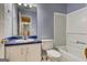 Functional bathroom with a vibrant blue countertop, offering a practical and colorful space at 113 Elmwood Dr, Hampton, GA 30228