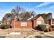 Entrance to Elmwood community featuring brick pillars and wrought iron gates at 113 Elmwood Dr, Hampton, GA 30228