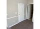 Inviting entryway with tile flooring and a view into an adjacent room at 113 Elmwood Dr, Hampton, GA 30228