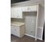 Kitchen featuring white cabinetry and ample countertop space at 113 Elmwood Dr, Hampton, GA 30228