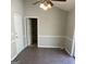 Living room featuring tile floors and natural light at 113 Elmwood Dr, Hampton, GA 30228