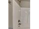 This is a detail shot of a white shower and shower head at 1820 Cobblefield Cir, Dacula, GA 30019