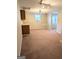 Finished basement features a carpeted floor and built-in cabinets with counter space at 1581 Shetland Pony Nw Ct, Suwanee, GA 30024