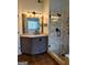 Renovated bathroom featuring walk-in shower and granite counter at 1581 Shetland Pony Nw Ct, Suwanee, GA 30024