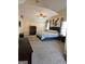 Spacious bedroom with carpeting, vaulted ceiling and en-suite at 1581 Shetland Pony Nw Ct, Suwanee, GA 30024