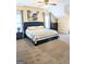 Spacious main bedroom with a large bed, neutral carpet, and multiple windows for ample natural light at 1581 Shetland Pony Nw Ct, Suwanee, GA 30024
