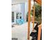 Cozy patio with blue outdoor furniture and landscaped yard at 1581 Shetland Pony Nw Ct, Suwanee, GA 30024
