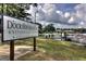 A beautiful view of Dockside Marina Restaurant & Bar and the peaceful lake with boats docked in the marina at 1252 Heritage Dr, Villa Rica, GA 30180