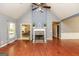 Bright living room features a fireplace and beautiful hardwood floors at 1252 Heritage Dr, Villa Rica, GA 30180