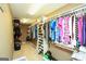 Spacious walk-in closet with built-in shelving and ample hanging space for clothes and accessories at 1252 Heritage Dr, Villa Rica, GA 30180