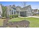 Home exterior showing a walkway to the front door, landscaped front yard and driveway at 608 White Cedar Ct, Peachtree City, GA 30269