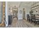 Beautifully staged foyer with a view to the dining room at 608 White Cedar Ct, Peachtree City, GA 30269