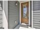 Close up of front door with door mat at 608 White Cedar Ct, Peachtree City, GA 30269