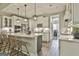 Modern kitchen with an island, stainless steel appliances, and plenty of cabinet space at 608 White Cedar Ct, Peachtree City, GA 30269
