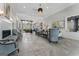 Spacious lobby area with comfortable seating, modern decor and a fireplace at 608 White Cedar Ct, Peachtree City, GA 30269