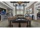 Comfortable lobby with lots of seating, a bar and large chandeliers at 608 White Cedar Ct, Peachtree City, GA 30269