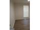 Bright bedroom with natural light, modern window blinds, and light wood-look floors at 349 Saratoga Pl, Riverdale, GA 30296