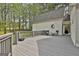 View of back deck with outdoor seating area at 225 Mapledale Trl, Sharpsburg, GA 30277