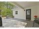 View of covered back deck area at 225 Mapledale Trl, Sharpsburg, GA 30277
