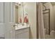 Tidy bathroom offers a shower and vanity, perfect for a quick refresh at 225 Mapledale Trl, Sharpsburg, GA 30277