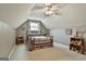 Cozy bedroom with carpet, ceiling fan, and decor at 225 Mapledale Trl, Sharpsburg, GA 30277