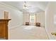Large carpeted bedroom featuring a vaulted ceiling and ample natural light at 11970 Fairway Overlook, Fayetteville, GA 30215