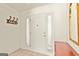 Classic white front door with sidelights welcomes you into the home at 11970 Fairway Overlook, Fayetteville, GA 30215
