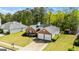 A well-maintained single-Gathering home with a two-car garage and a lush lawn at 11970 Fairway Overlook, Fayetteville, GA 30215