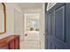 Inviting foyer with neutral tones leads to a spacious living area at 11970 Fairway Overlook, Fayetteville, GA 30215