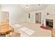 Spacious living room featuring vaulted ceilings and a cozy fireplace at 11970 Fairway Overlook, Fayetteville, GA 30215