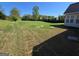 Large, well-maintained backyard offers plenty of space for outdoor activities and relaxation at 35 Charleston Ln, Covington, GA 30016