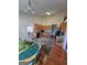 Open kitchen design with hardwood floors and a breakfast area at 35 Charleston Ln, Covington, GA 30016