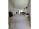Spacious living room with a fireplace and large sectional sofa at 35 Charleston Ln, Covington, GA 30016