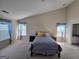 Large bedroom with vaulted ceilings and lots of natural light at 35 Charleston Ln, Covington, GA 30016