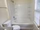 A bathroom with a shower and tub combination at 2337 Carousel Park Dr, Morrow, GA 30260