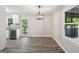 Eat-in kitchen boasts updated stainless appliances and view to a private backyard deck at 264 Rockin Hill Sw Dr, Marietta, GA 30060