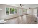 Spacious living area filled with natural light showcasing updated flooring and fixtures at 264 Rockin Hill Sw Dr, Marietta, GA 30060
