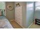 Bedroom corner showcasing a white dresser, window, and neutral color scheme with coordinated wall decor at 270 Polk Rd, Covington, GA 30014