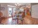 Charming dining area with glass table, decorative chairs, and access to the outdoors at 270 Polk Rd, Covington, GA 30014