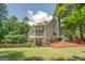 House exterior with screened-in porch and a manicured lawn at 270 Polk Rd, Covington, GA 30014