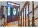 Foyer with hardwood floors, stylish front door, and staircase at 270 Polk Rd, Covington, GA 30014