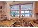 Kitchen sink area with a view of a lake and a window at 270 Polk Rd, Covington, GA 30014