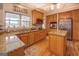 Modern kitchen with granite counters, stainless appliances, and wood cabinetry at 270 Polk Rd, Covington, GA 30014
