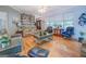 Bright living room with hardwood floors, neutral decor, and comfortable seating at 270 Polk Rd, Covington, GA 30014