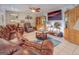Cozy living room featuring plush leather furniture, a ceiling fan, and neutral decor, perfect for relaxation and entertainment at 270 Polk Rd, Covington, GA 30014